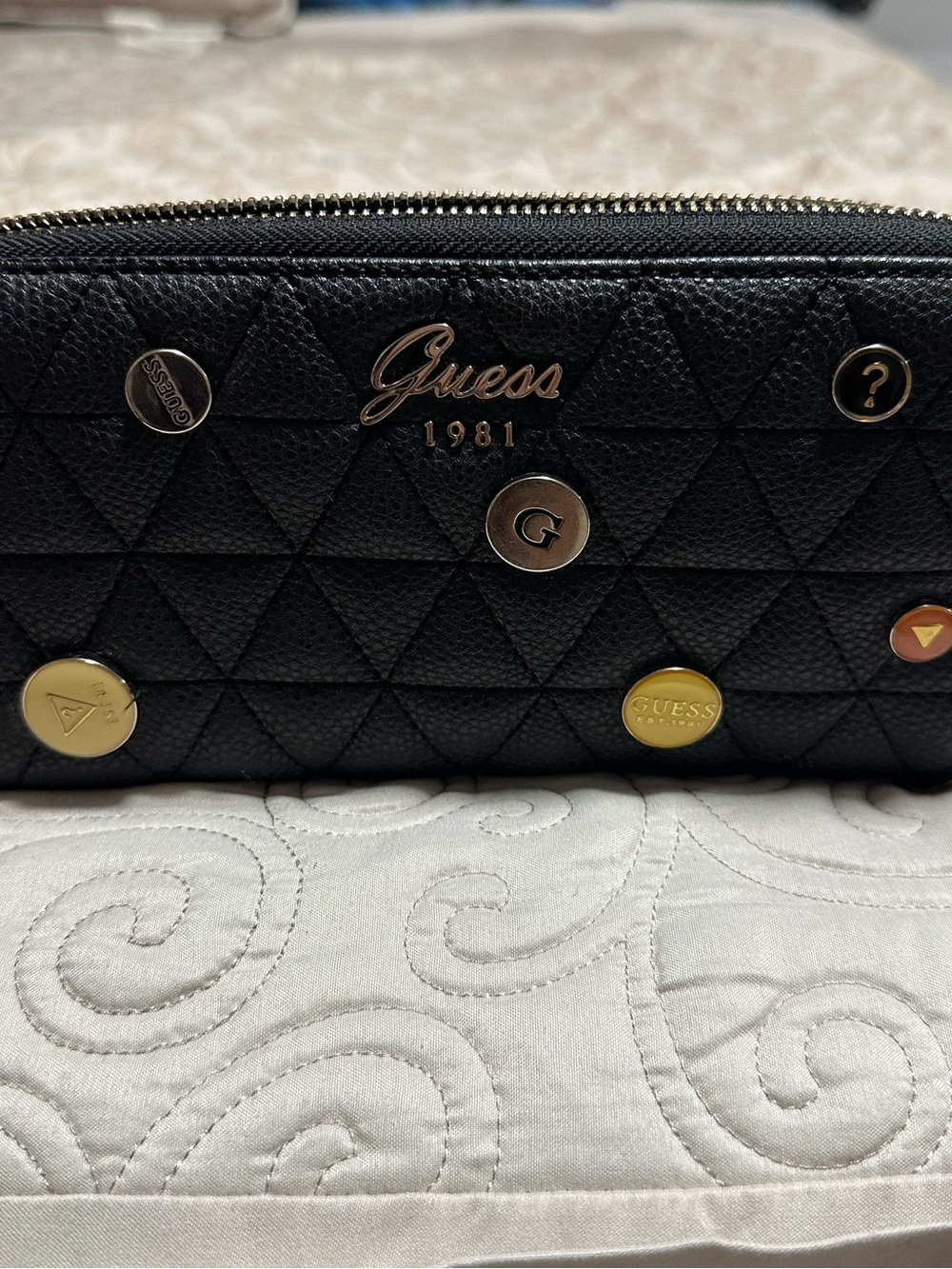 GUESS Black Quilted Zip-Around Wallet with Gold Stud Accents